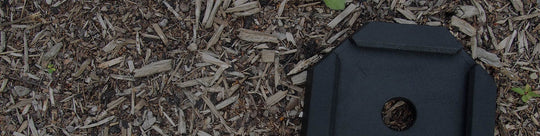 single SnapPad lies on a mulch covered ground