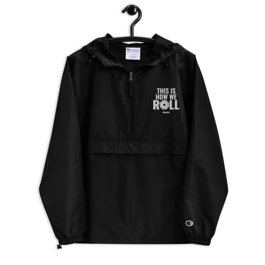 Black compact SnapPad rain jacket