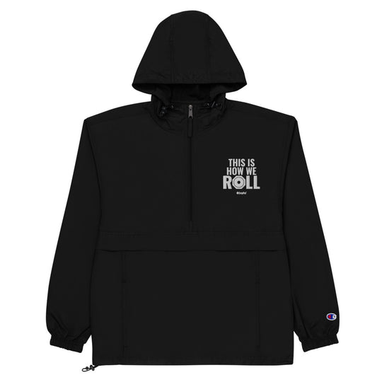 Black compact SnapPad rain jacket